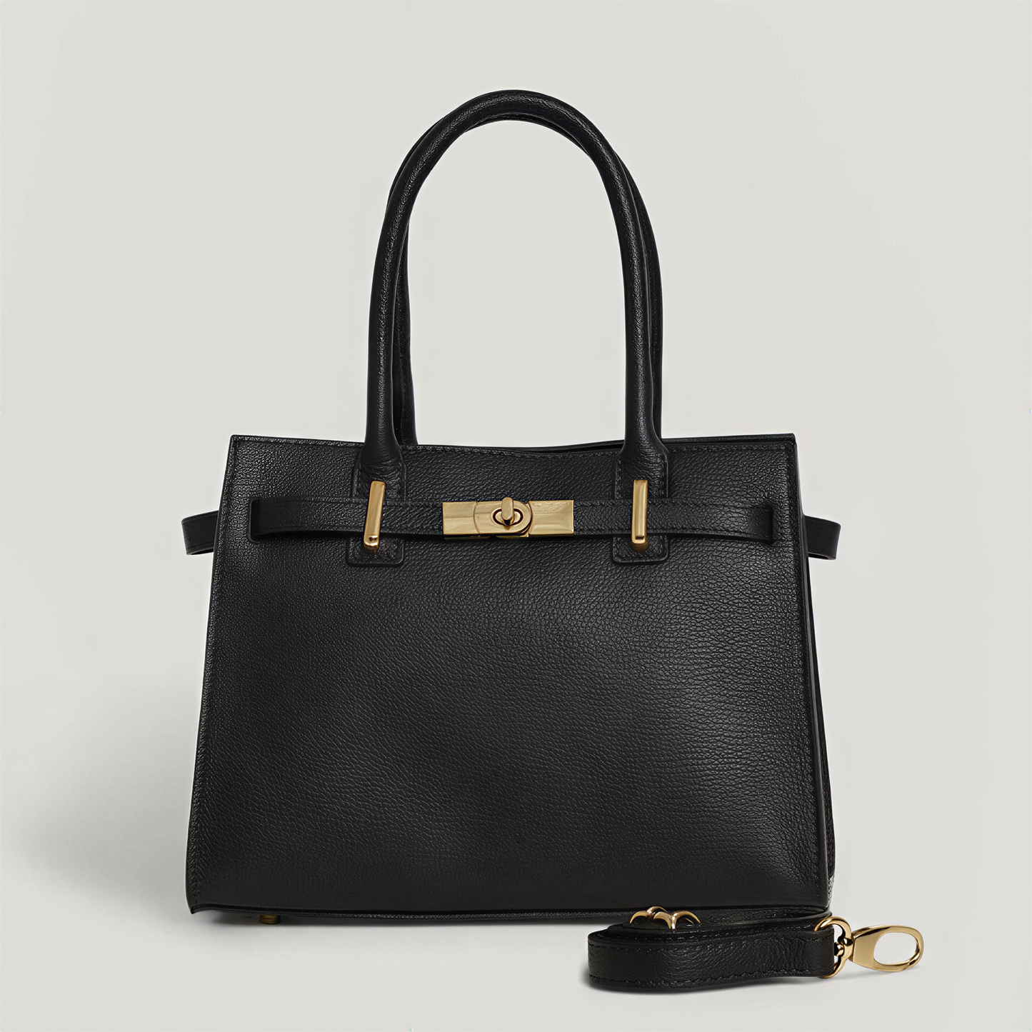 Genuine Leather bag with shoulder strap and gold accessories: Cognac