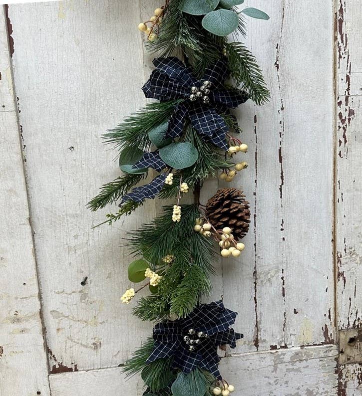 Cross Check Pointsettia Garland With Pine Cones